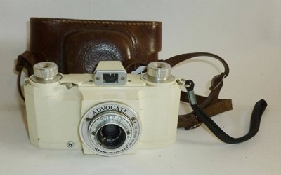 Lot 1216 - An Ilford Advocate Camera, with ivory enamelled metal body, Dallmeyer F/3.5 35mm lens, in a...