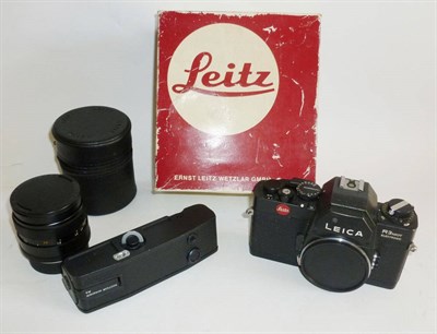 Lot 1219 - A Leica R3 Mot Electronic Camera No.1494335, black Portugal model, with motor winder, Elmarit-R...