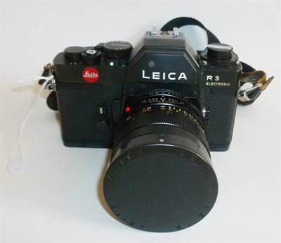 Lot 1224 - A Leica R3 Electronic Camera No.1466299, black Portugal model, with Macro-Elmarit-R 60mm f/2.8...