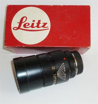 Lot 1229 - A Leica Elmarit-R 180mm f/2.8 Lens No.2839552, black bayonet mount lens, with lens cover, in a...