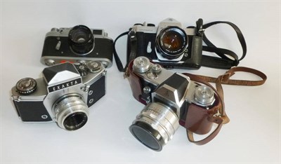 Lot 1238 - Four 35mm Cameras - Exacta VX1000, Pentacon FM, Zorki-4 and Pentax Spotmatic, three in leather...