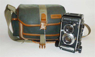 Lot 1241 - A Mamiya C330 Professional TLR Camera No.D126805, with Mamiya-Sekor f2.8/80mm lens, in a...