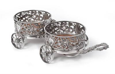 Lot 438 - A Victorian Silver Plated Decanter Wagon, Elkington & Co, the twin circular coasters with...