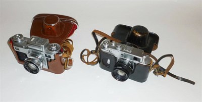 Lot 1248 - Two Russian 35mm Cameras - Kiev-4 with f/2 50mm lens, in a stitched leather case and Zorki-4...