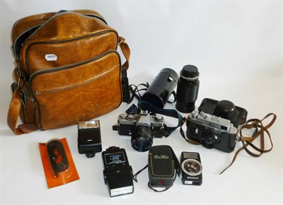 Lot 1258 - Cameras and Accessories, including a chrome Minolta XD7 35mm camera, a Zorki 4 35mm camera, Panagor