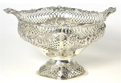 Lot 445 - A George V Pierced Silver Basket, Goldsmiths & Silversmiths Co Ltd, London 1914, the deep oval bowl