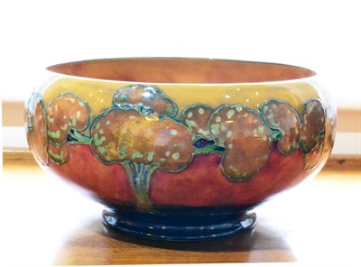 Lot 465 - A William Moorcroft Flambé Eventide Landscape Pattern Pedestal Bowl, circa 1920s, tubelined...