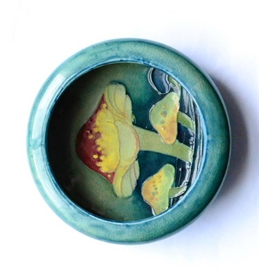 Lot 466 - A William Moorcroft Claremont Toadstool Pattern Dish, on a blue/green ground, impressed factory...