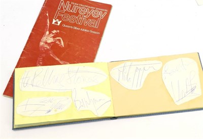 Lot 3095 - An Autograph Book Containing Stuck In Signatures of The Rolling Stones, four members not...