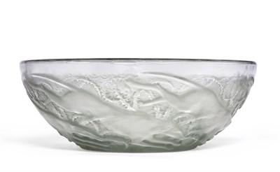 Lot 485 - A René Lalique Chiens Clear and Frosted Glass Bowl, with blue staining, moulded with a frieze...