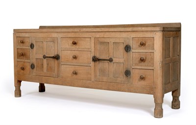 Lot 507 - A 1930s/40s Robert  "Mouseman " Thompson Oak 5'11 " Sideboard, with raised upstand, above a central