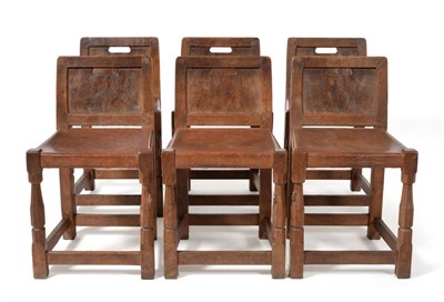 Lot 509 - A Set of Six 1930s/40s Robert  "Mouseman " Thompson Burr Oak Solid Back Chairs, with aperture...