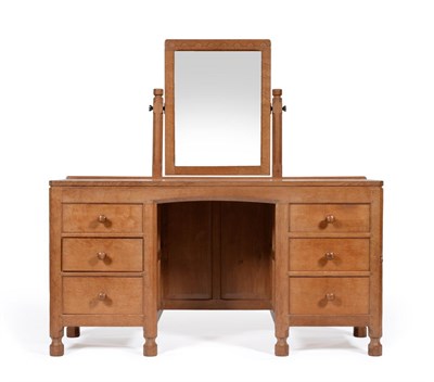 Lot 517 - A Robert  "Mouseman " Thompson Panelled Oak Dressing Table, with rectangular fixed central...