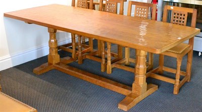 Lot 537 - A Robert  "Mouseman " Thompson 7' Oak Refectory Table, on two octagonal turned legs, joined by...