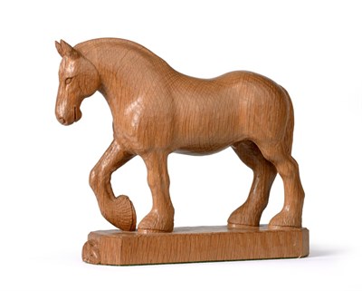 Lot 553 - A Robert  "Mouseman " Thompson Carved Oak Shire Horse, modelled with right front leg raised, on...