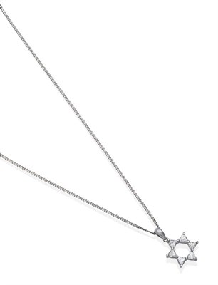 Lot 2012 - An 18 Carat White Gold Diamond Star Pendant, on Chain, six trilliant cut diamonds in claw...