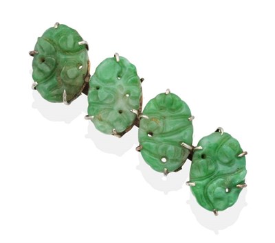Lot 2013 - A Jade Brooch, four oval carved and pierced jade plaques in claw settings, measures 1.5cm by...