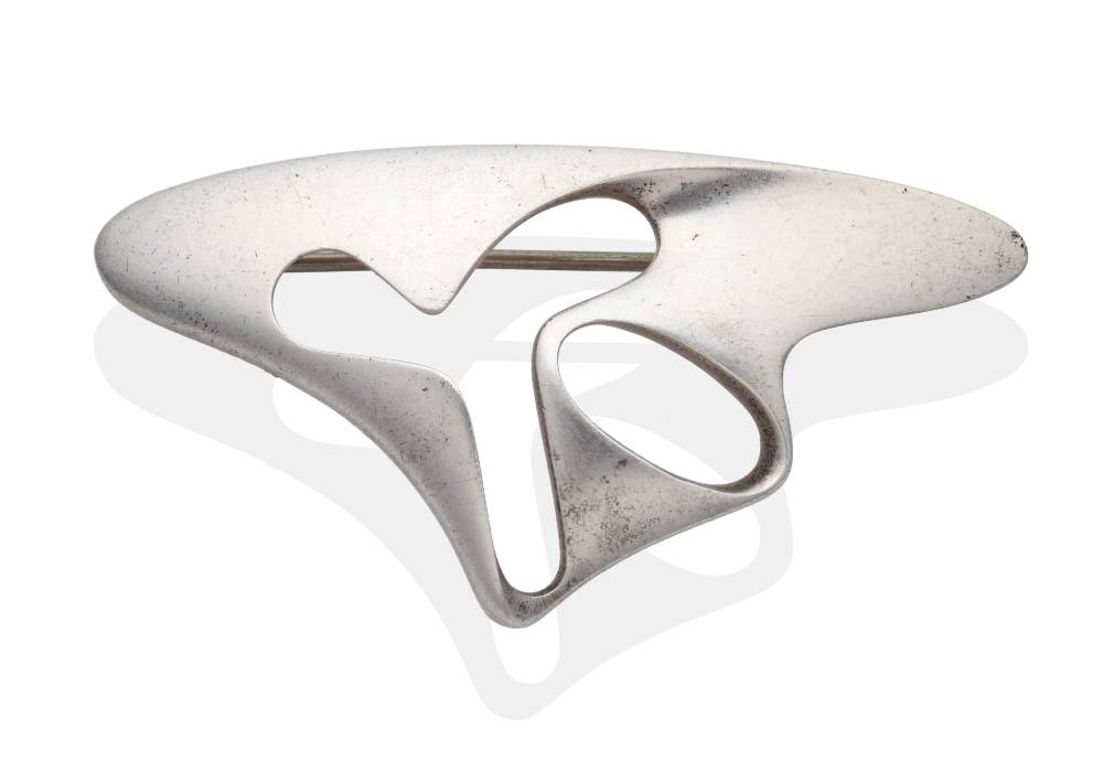 Lot 2030 - A Georg Jensen Brooch, designed by Henning Koppel, model 325, of pierced amorphous form,...
