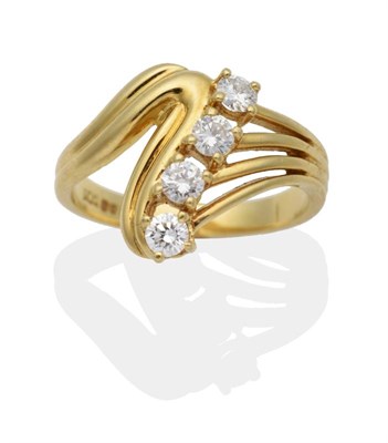 Lot 2036 - An 18 Carat Gold Diamond Ring, four round brilliant cut diamonds in claw settings, each at the...