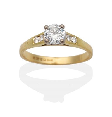 Lot 2049 - An 18 Carat Gold Solitaire Diamond Ring, a round brilliant cut diamond in a claw setting, to...