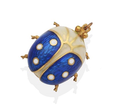 Lot 2065 - An Enamel Beetle Brooch, with an oval body, decorated in blue and white guilloche enamel,...