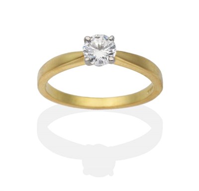 Lot 2066 - An 18 Carat Gold Solitaire Diamond Ring, a round brilliant cut diamond in a claw setting, to...