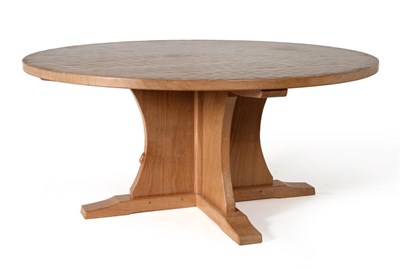 Lot 573 - A Robert  "Mouseman " Thompson 5'6 " Bespoke Oak Circular Dining Table, on a cruciform base,...