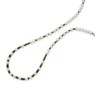 Lot 2085 - A Chrome Diopside and Cultured Pearl Necklace, faceted chrome diopside beads spaced by groups...