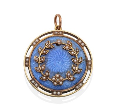 Lot 2091 - An Early Twentieth Century Blue Guilloche Enamel and Seed Pearl Pendant, a circular enamel...