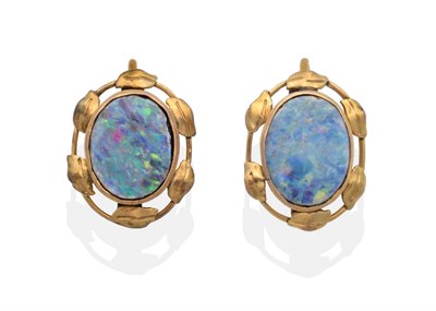 Lot 2092 - A Pair of Arts & Crafts Opal Doublet Earrings, an oval opal doublet in a rubbed over setting within
