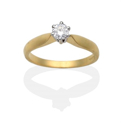 Lot 2097 - An 18 Carat Gold Solitaire Diamond Ring, a round brilliant cut diamond in a claw setting, to...
