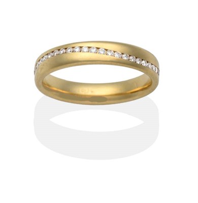 Lot 2098 - An 18 Carat Gold Diamond Eternity Ring, channel set with an undulating band of round brilliant...