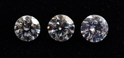 Lot 2104 - Three Loose Round Brilliant Cut Diamonds, weighing 0.31 carat, 0.30 carat and 0.30 carat;...