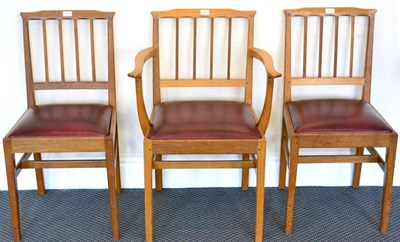 Lot 580 - A Set of Ten (8+2) Alan Grainger Acorn Industries Oak Dining Chairs, in the Cotswold tradition, the