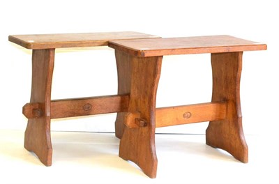 Lot 581 - A Pair of Alan Grainger Acorn Industries Oak Stools, the rectangular top on two shaped supports...