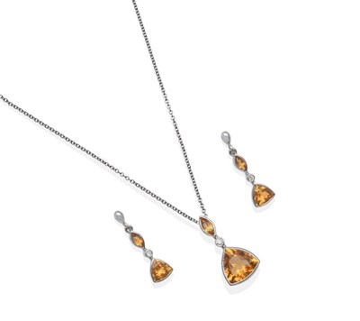 Lot 2136 - A 9 Carat White Gold Citrine and Diamond Pendant and Earring Suite, a marquise cut citrine...