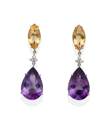 Lot 2143 - A Pair of Amethyst, Citrine and Diamond Earrings, a marquise cut citrine suspends a cluster of...