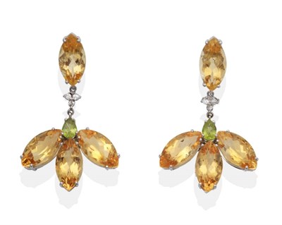 Lot 2145 - A Pair of Citrine, Peridot and Diamond Earrings, a marquise cut citrine suspends a cluster of three