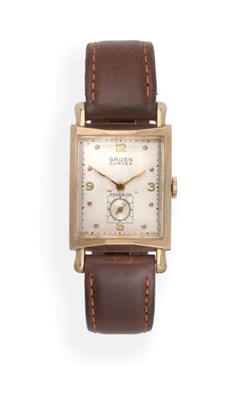 Lot 2149 - A 10ct Gold Filled Curved Wristwatch, signed Gruen, Precision, circa 1942, (calibre 370) curved...