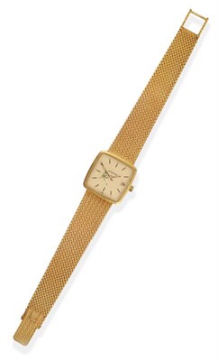 Lot 2160 - A Lady's 18ct Gold Calendar Wristwatch, signed Eterna, circa 1980, quartz movement, champagne...