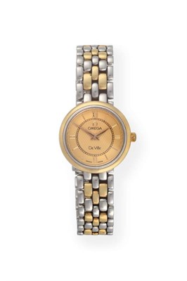 Lot 2168 - A Lady's Bi-Metal Wristwatch, signed Omega, model: De Ville, circa 1995, quartz movement, gold...