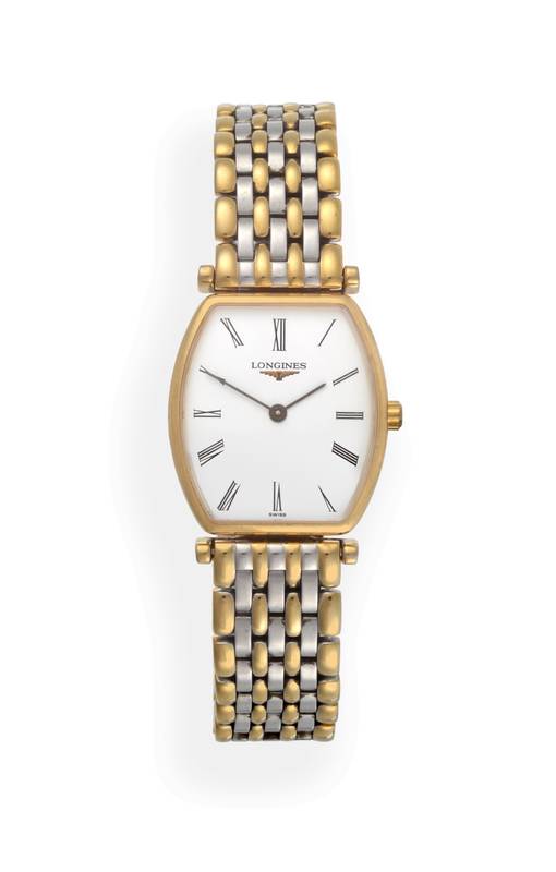 Lot 2173 - A Lady's Bi-Metal Tonneau Shaped Wristwatch, signed Longines, model: La Grande Classique de...