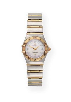 Lot 2175 - A Lady's Steel and Gold Wristwatch with Diamond Set Dial Hour Markers, signed Omega, model:...