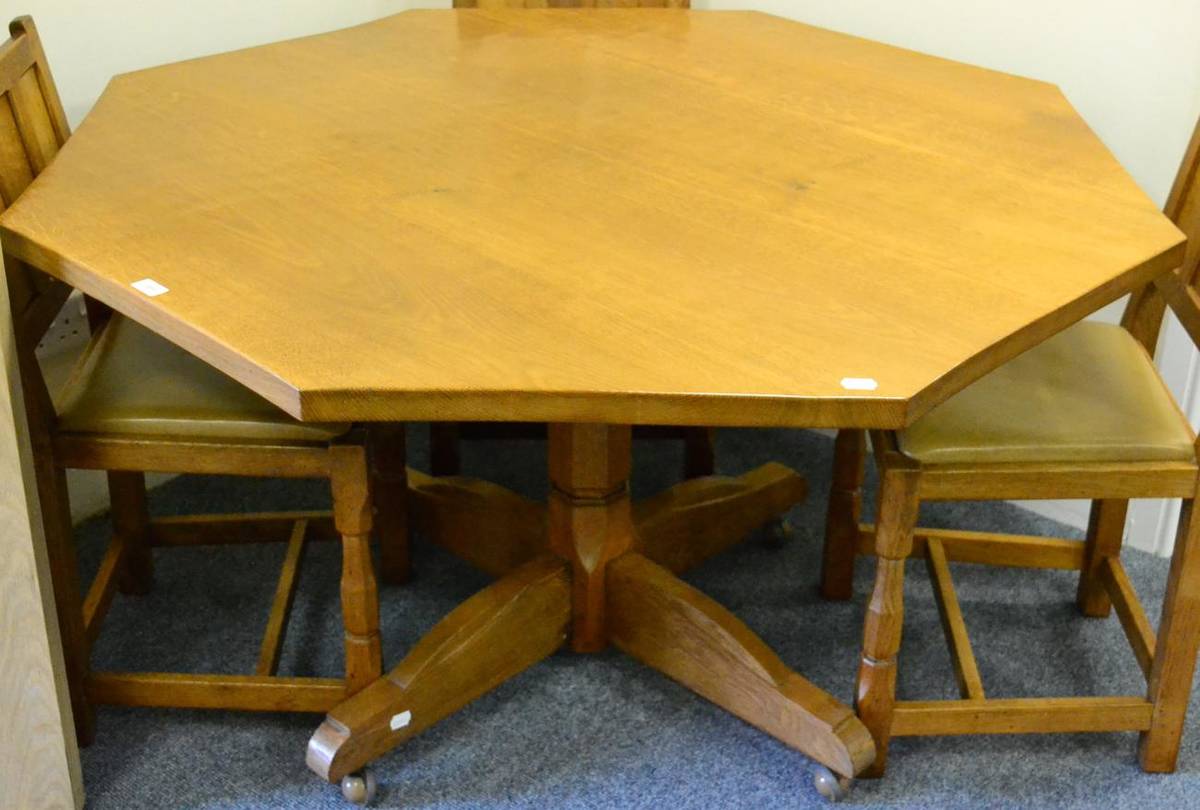 Lot 589 - A Colin  "Beaverman " Almack Octagonal Dining Table, on an octagonal column support and four...