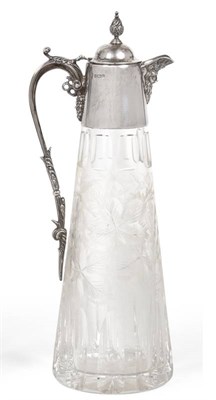 Lot 2209 - A Silver Mounted Cut Glass Claret Jug, C J Vander, Birmingham 1983, the mount with bearded mask...