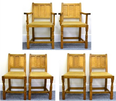 Lot 590 - A Set of Six (4+2) Colin  "Beaverman " Almack Oak Panel Back Dining Chairs, upholstered seats,...