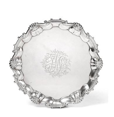 Lot 2239 - A George II Silver Salver, Hugh Mills, London 1747, shaped circular with shell and scroll rim,...