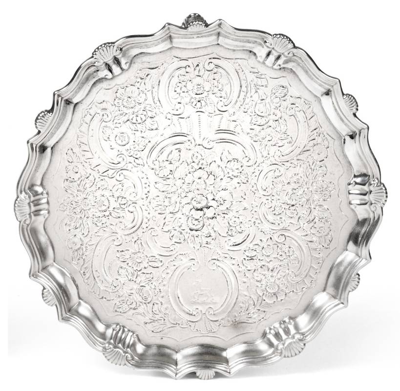 Lot 2244 - A George II Silver Salver, Elizabeth Tuite, London 1740, shaped circular with shell rim, on...