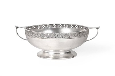 Lot 2278 - An Arts and Crafts Silver Twin Handled Bowl, A E Jones, Birmingham 1924, with planished finish...