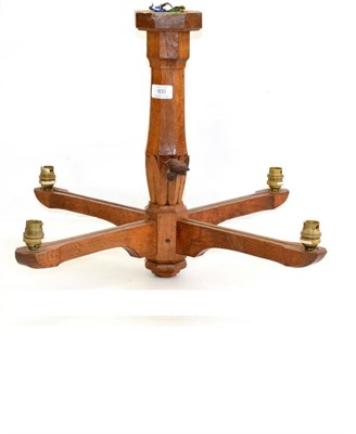 Lot 600 - A Bob  "Wrenman " Hunter Oak Four Branch Chandelier, with a ceiling mounted boss, above a...